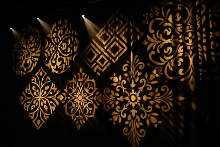 Gobo patterns dancing across a backdrop